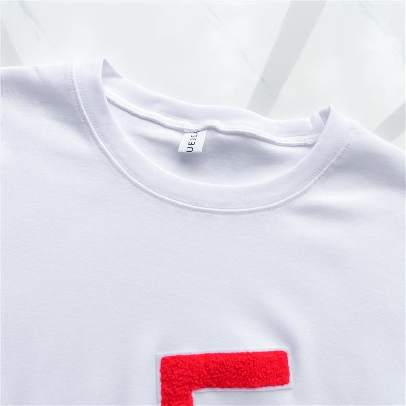 デザインセンスを繋ぎ合わせたミドル丈のルーズボトムシャツ<S-5051>