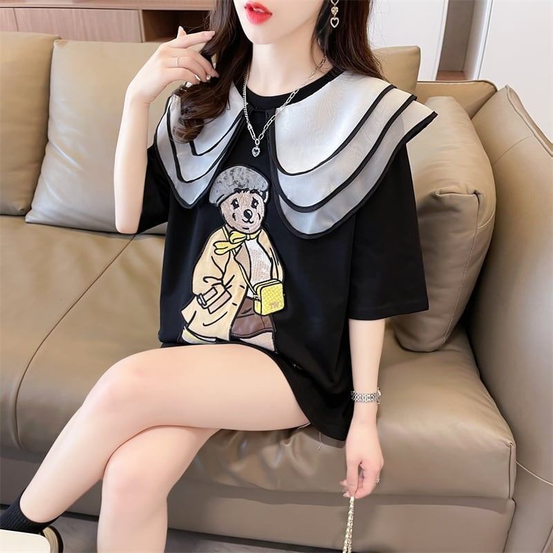 カレッジスタイルのゆったりとしたウエスタンスタイルのネイビーカラー漫画柄Tシャ<S-2897>