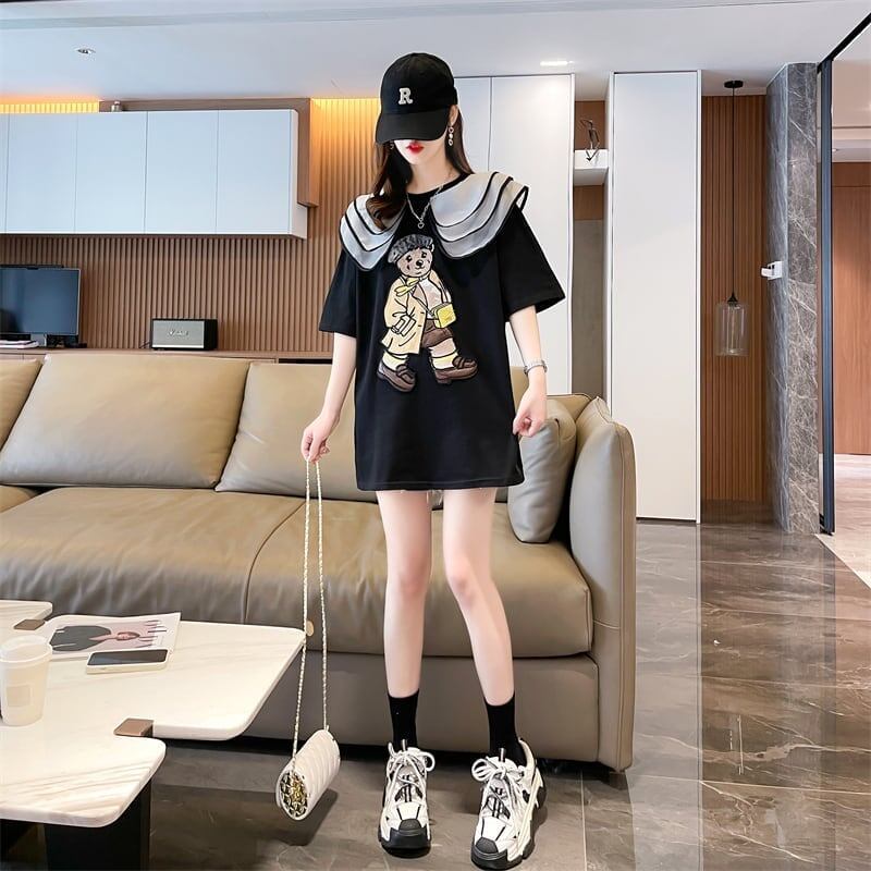 カレッジスタイルのゆったりとしたウエスタンスタイルのネイビーカラー漫画柄Tシャ<S-2897>